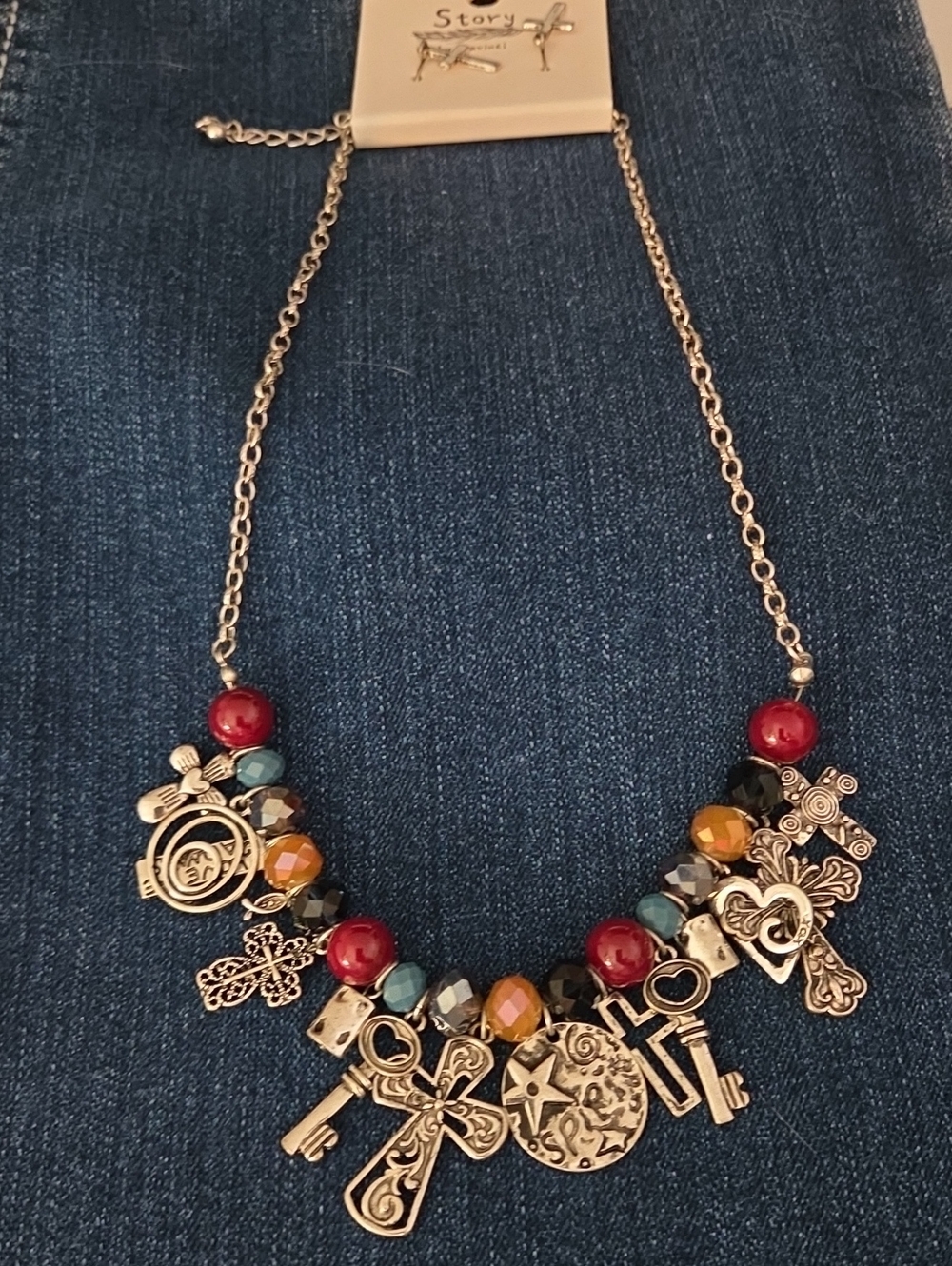 Tory Burch Silver-Tone Charm Necklace with Red, Blue, Black and Gold Accents